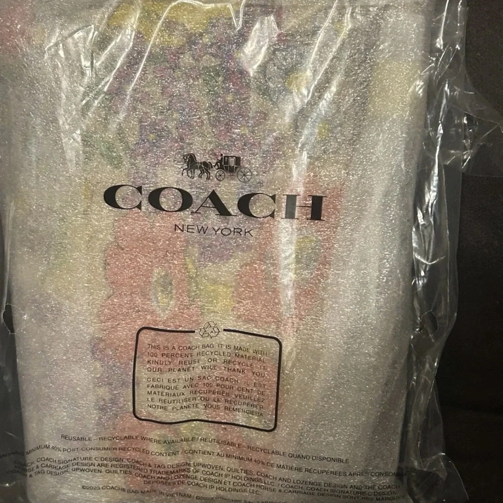 🎉NWT! Coach Multicolor Floral Wristlet Corner Zip!